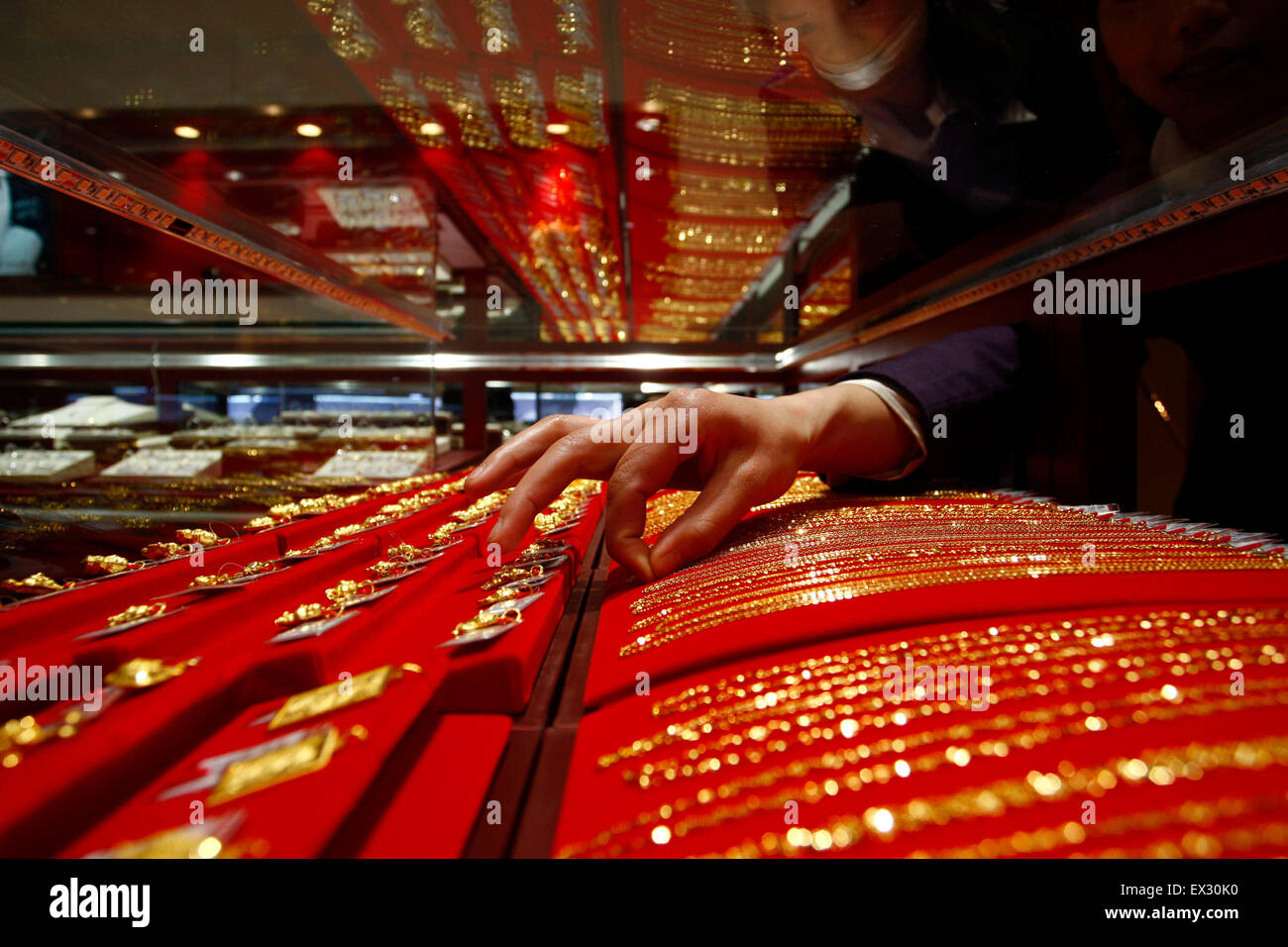 Gold accessories are seen on sale at a gold store in Suining, Sichuan