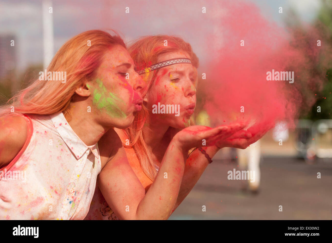 London, UK.  5 July 2015.  On the final day of the capital's Greenwich and Docklands International Festival 2015 and, in reinvention of India's traditional Holi festival, Artonik's dancers and musicians presented The Colour of Time.  They led a choreographed parade through the Olympic Park towards a huge finale, where brilliant shades of gulal powder were thrown into the air in a joyful celebration. Credit:  Stephen Chung / Alamy Live News Stock Photo