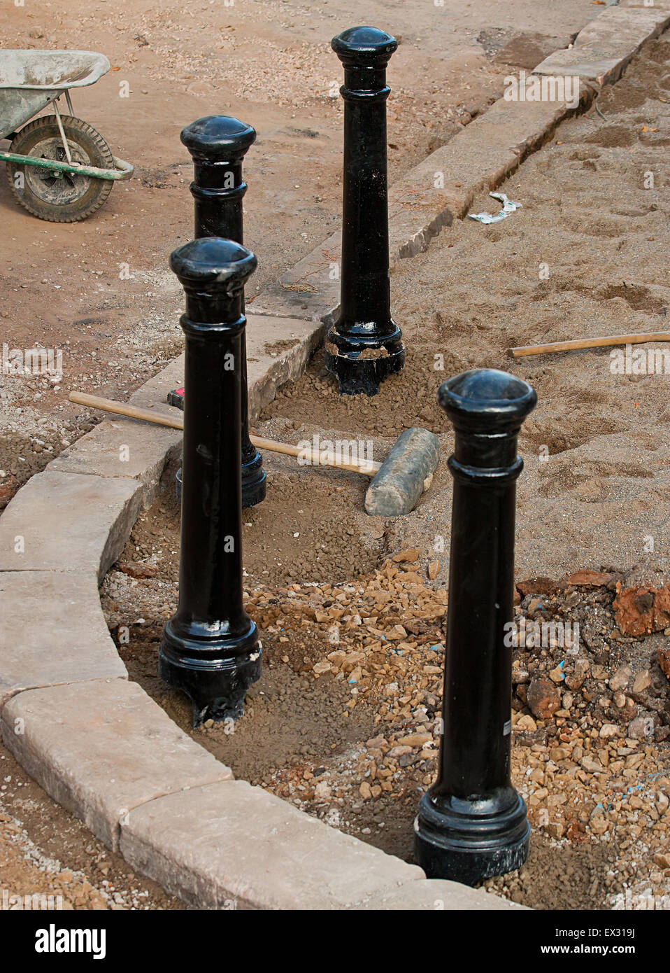 Cannon Cast Iron Pavement Bollards a Popular Street Furniture used in urban design to offer Pedestrian protection from vehicles. Stock Photo