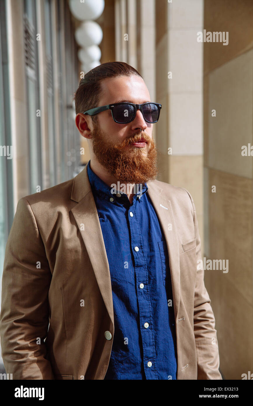 Bearded hipster sunglasses in the city Stock Photo
