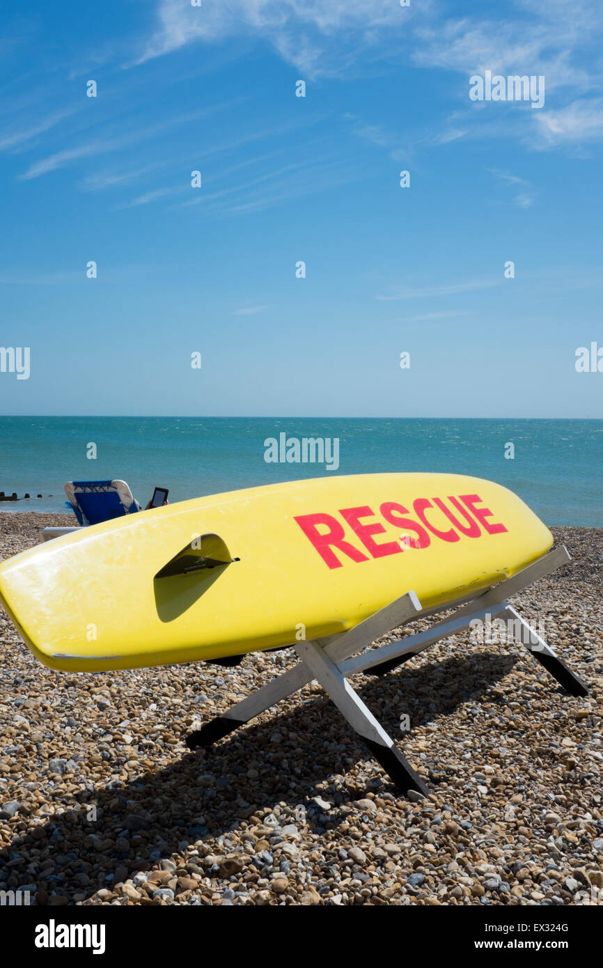 Lifeguard's surfboard at lifeguard station, on the beach at Eastbourne, England Stock Photo