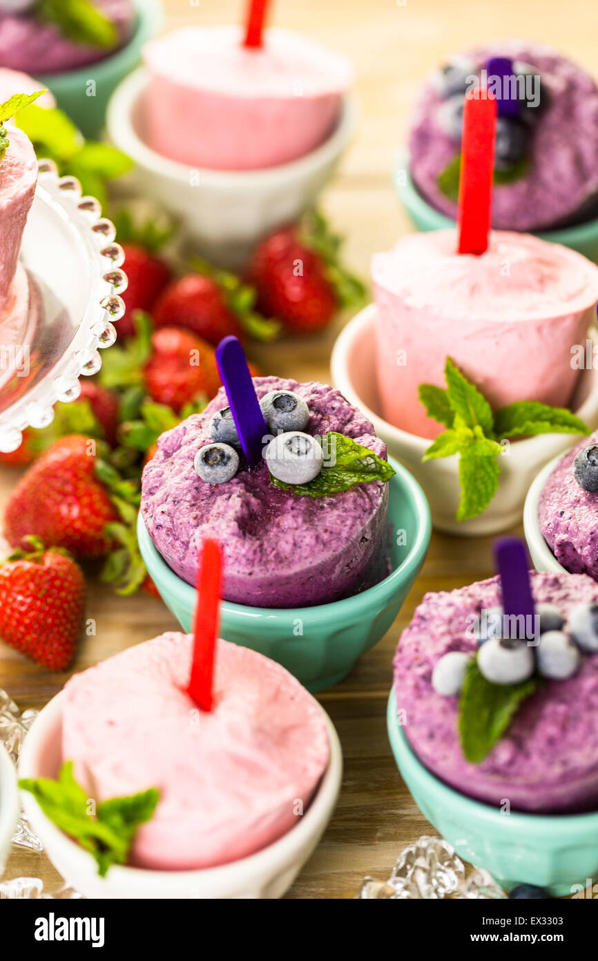Homemade blueberry and strawberry popsicles made in plastic cups Stock Photo Alamy