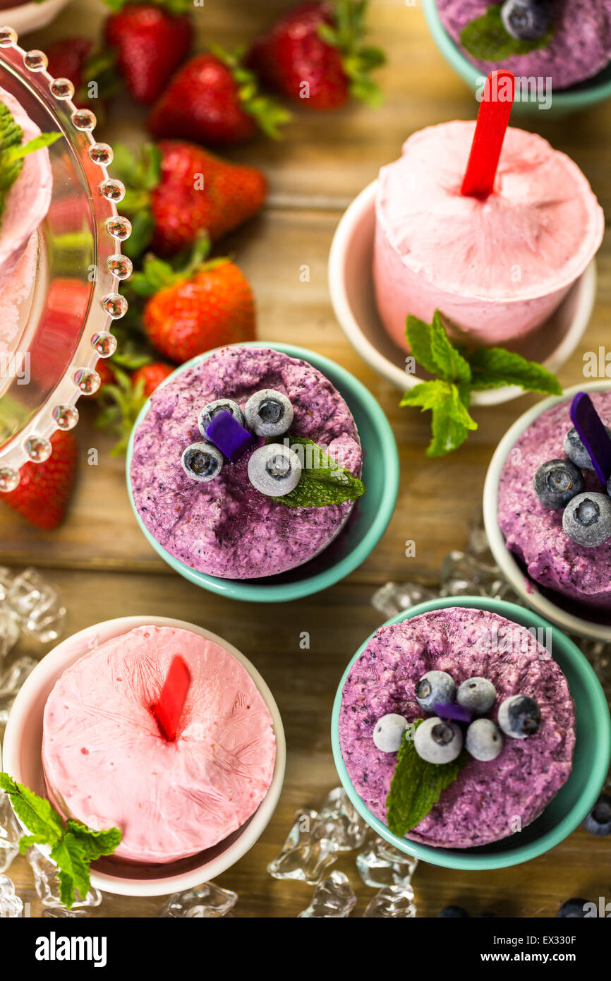 Homemade blueberry and strawberry popsicles made in plastic cups Stock Photo Alamy