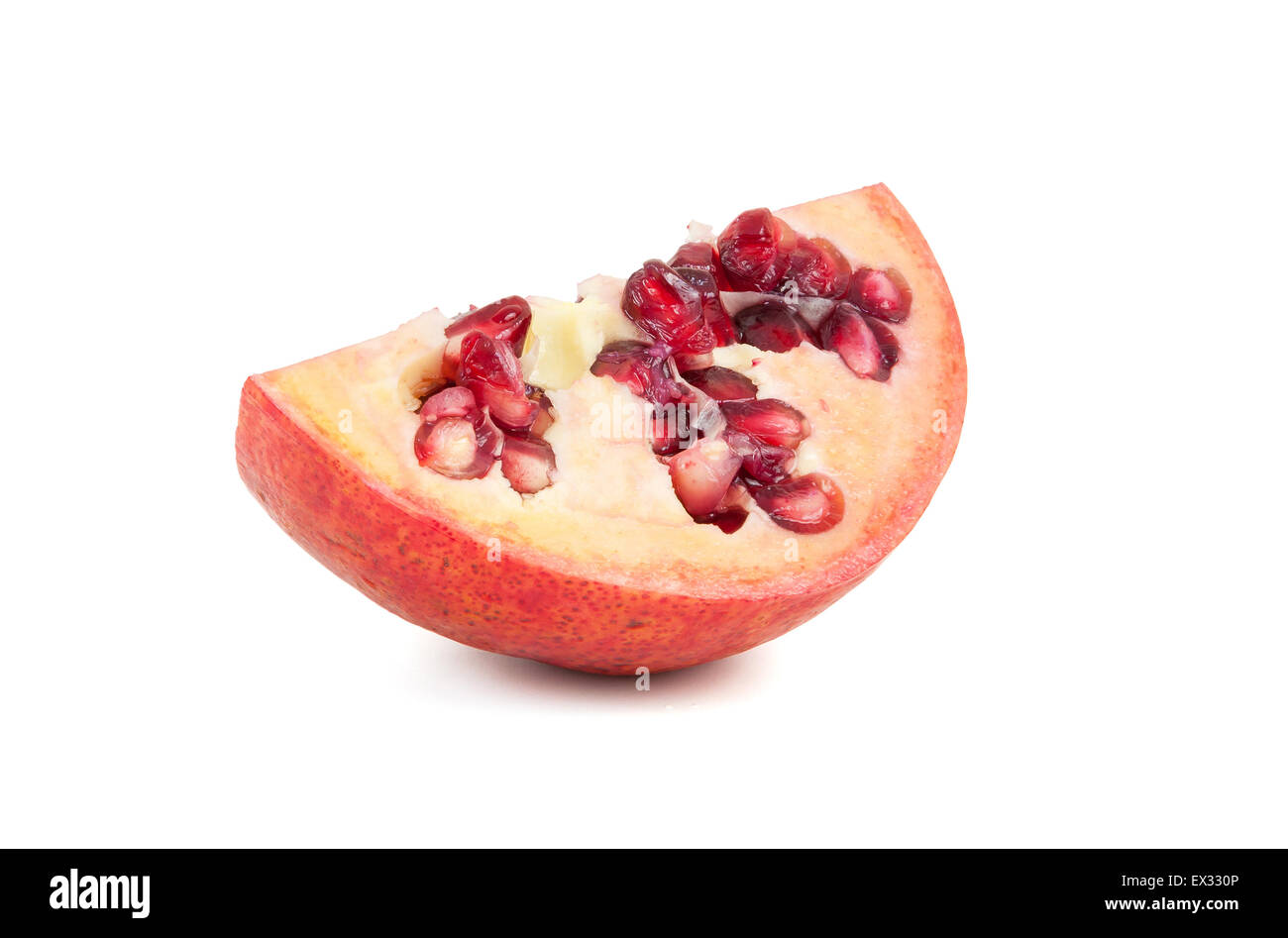 Piece of fresh pomegranate fruits isolated on white background with clipping path Stock Photo