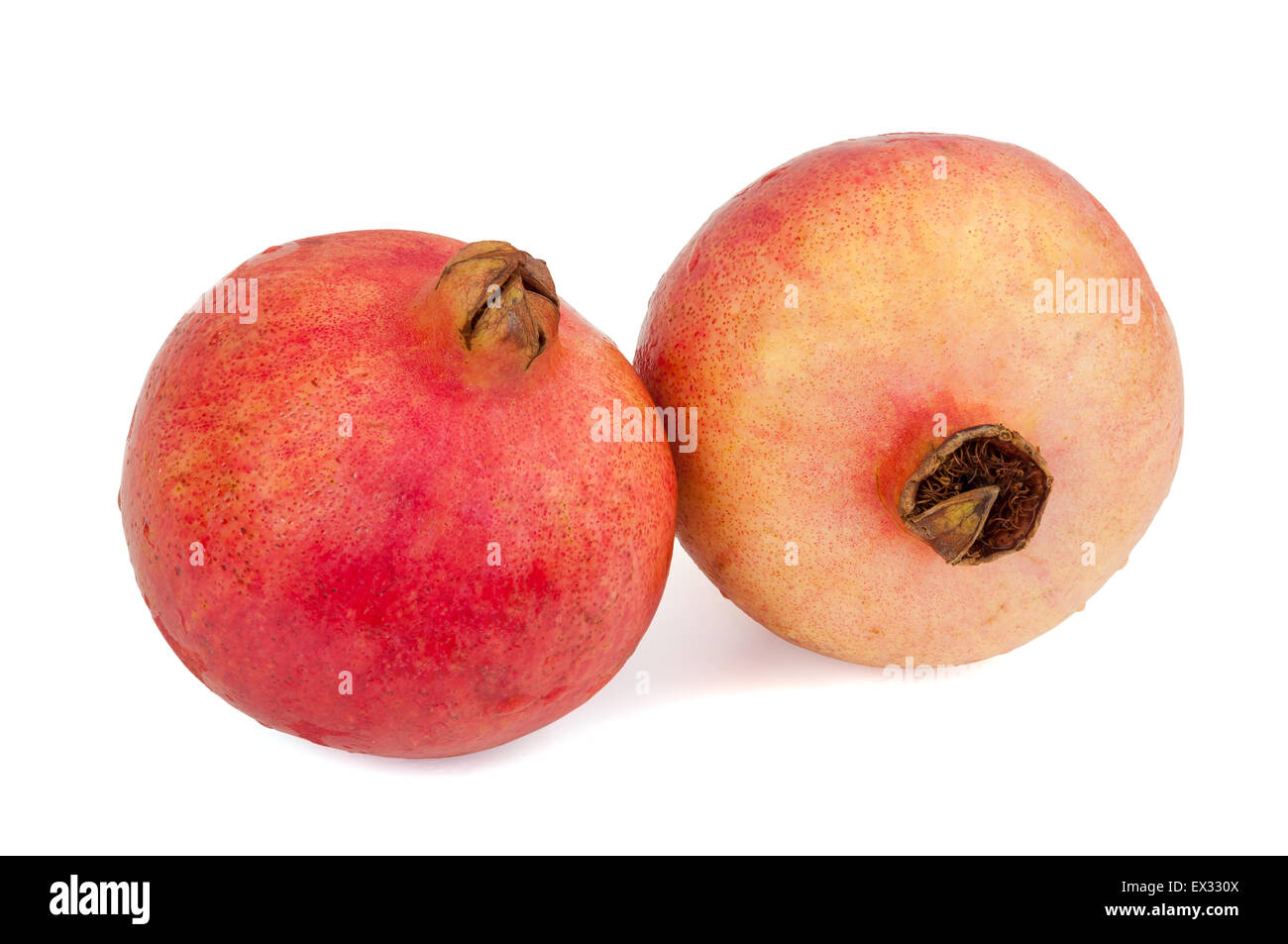 Fresh pomegranate fruits isolated on white background with clipping path Stock Photo