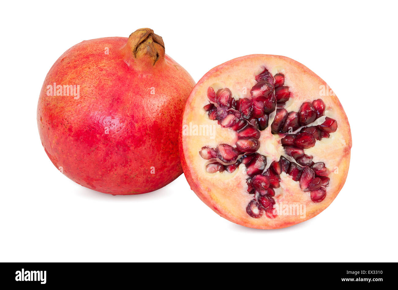 Fresh pomegranate fruits isolated on white background with clipping path Stock Photo