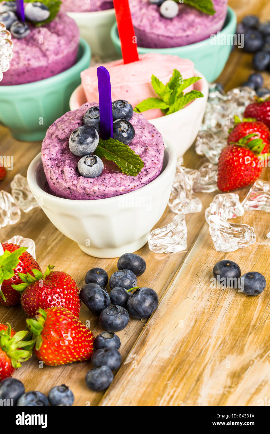 Homemade blueberry and strawberry popsicles made in plastic cups Stock Photo Alamy
