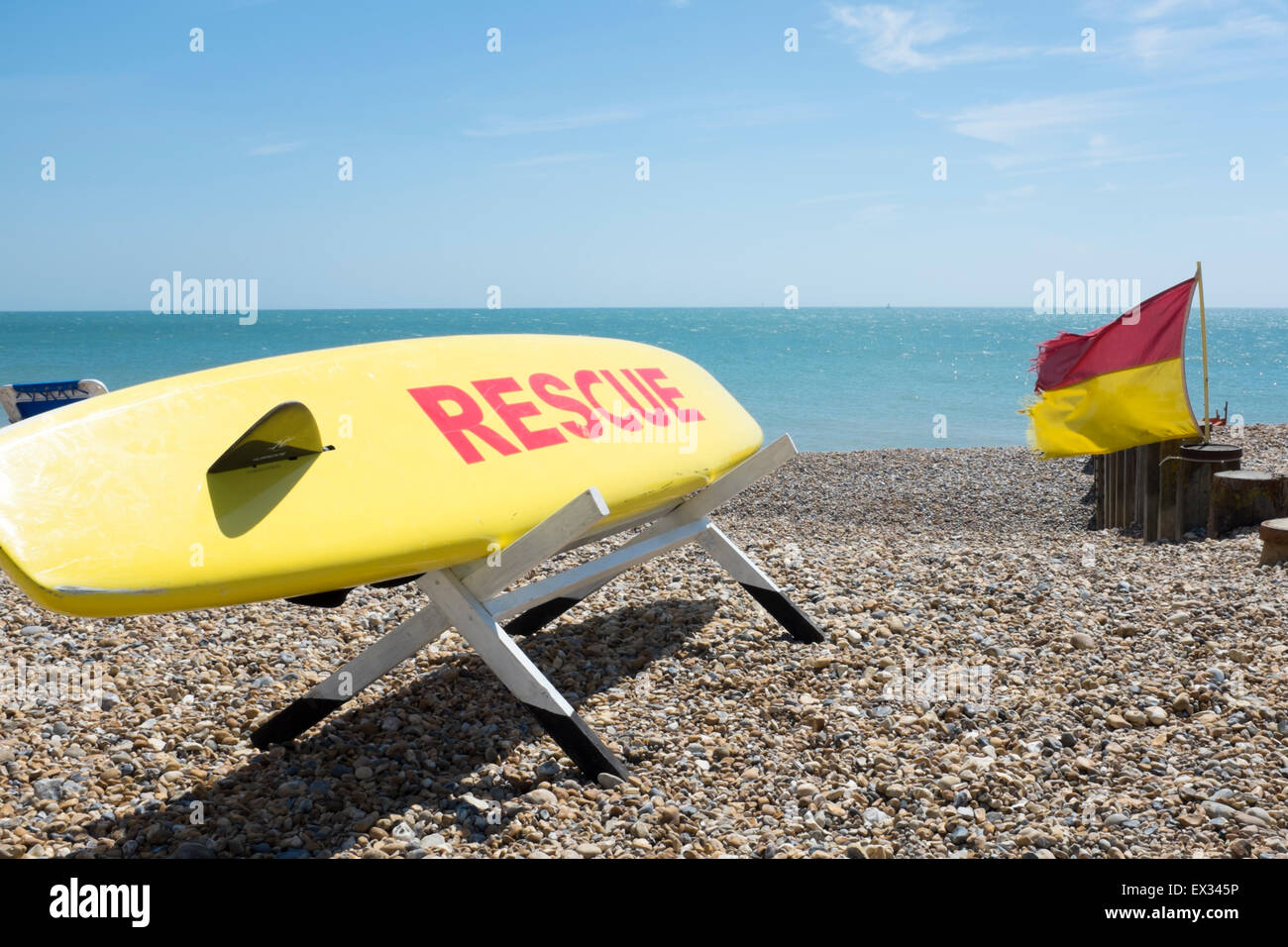 Lifeguard's surfboard at lifeguard station, on the beach at Eastbourne, England Stock Photo