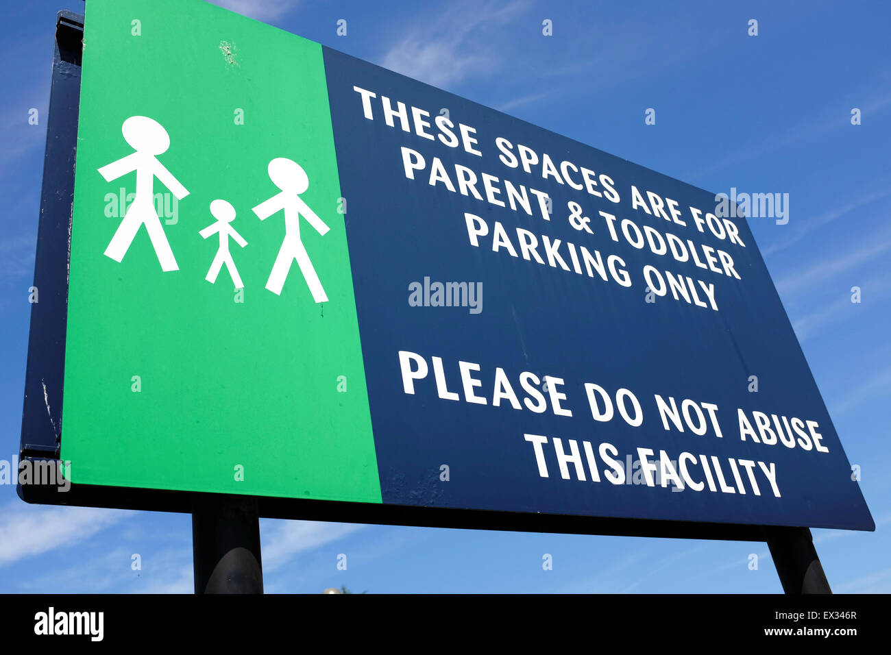 Close-up of parent and toddler parking space sign in supermarket car park Stock Photo