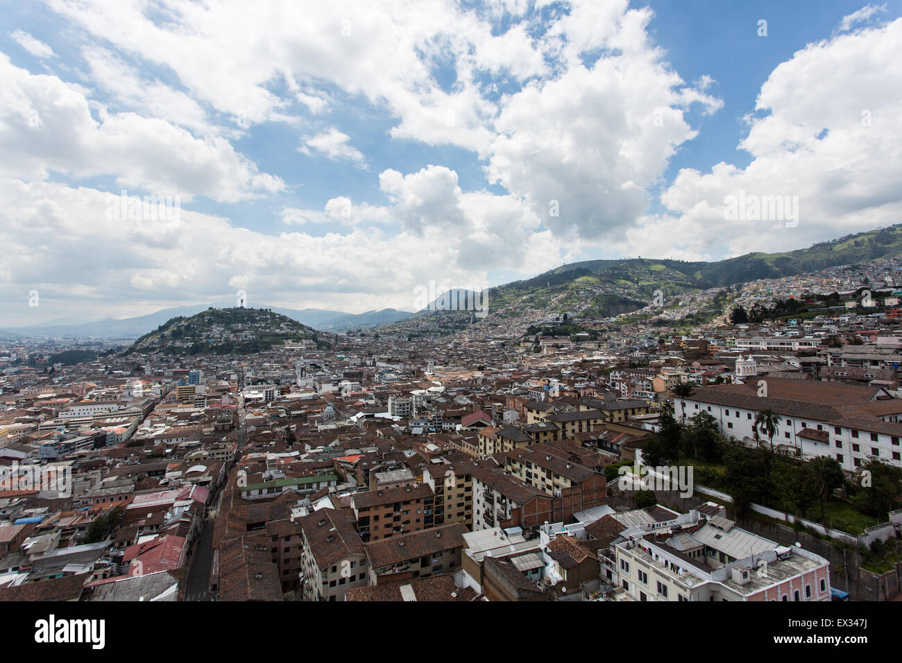 A view of the sloping hills of Quito, Ecuador with El Panecillo in the distance. Stock Photo