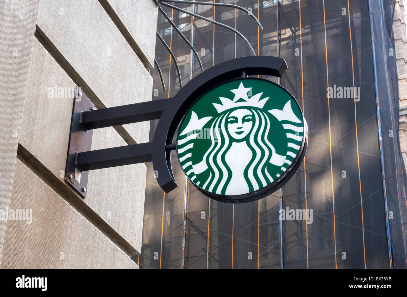 Starbucks sign with company icon outside a coffee shop in Starbucks sign with company icon outside a coffee shop in
