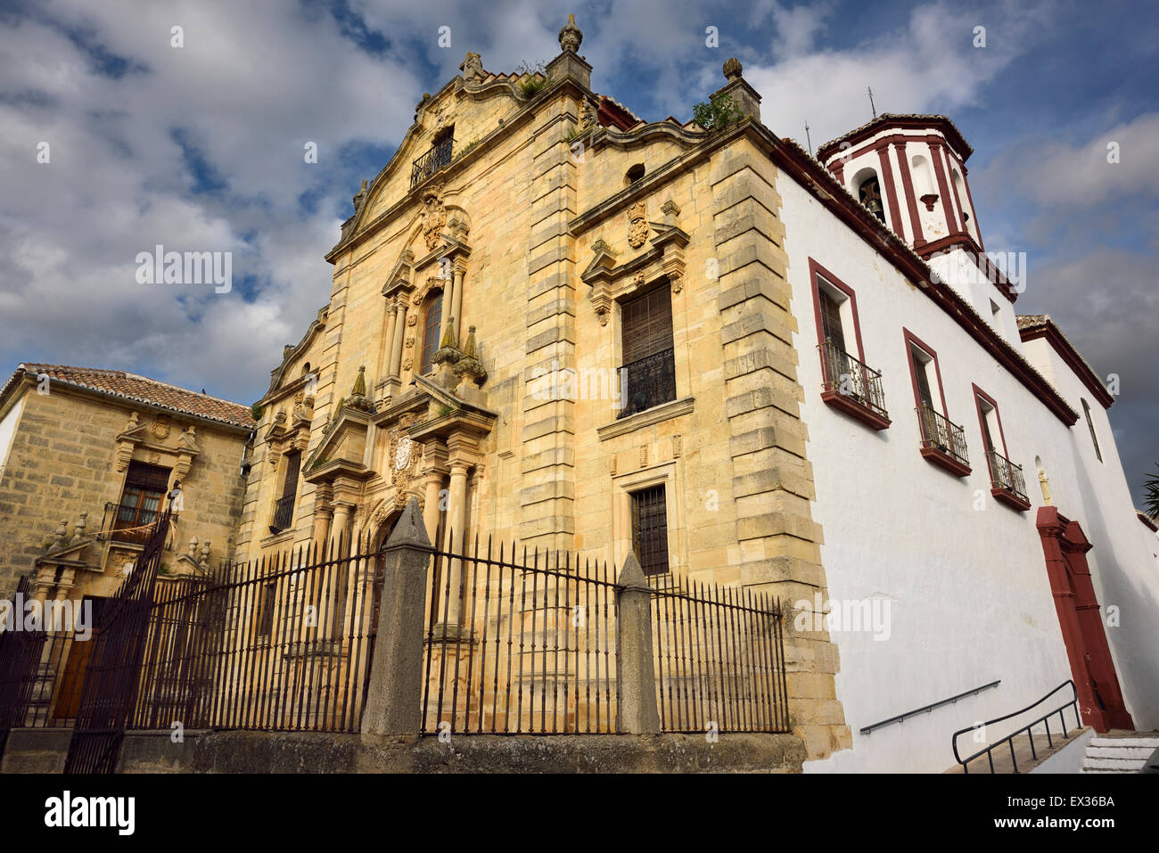 Baroque architecture and bell tower of Saint Cecilia Catholic Church in Ronda Spain Stock Photo