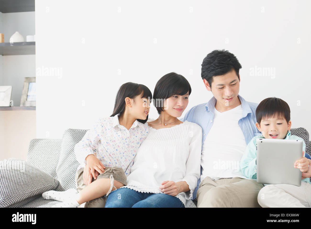 Japanese family on the sofa Stock Photo