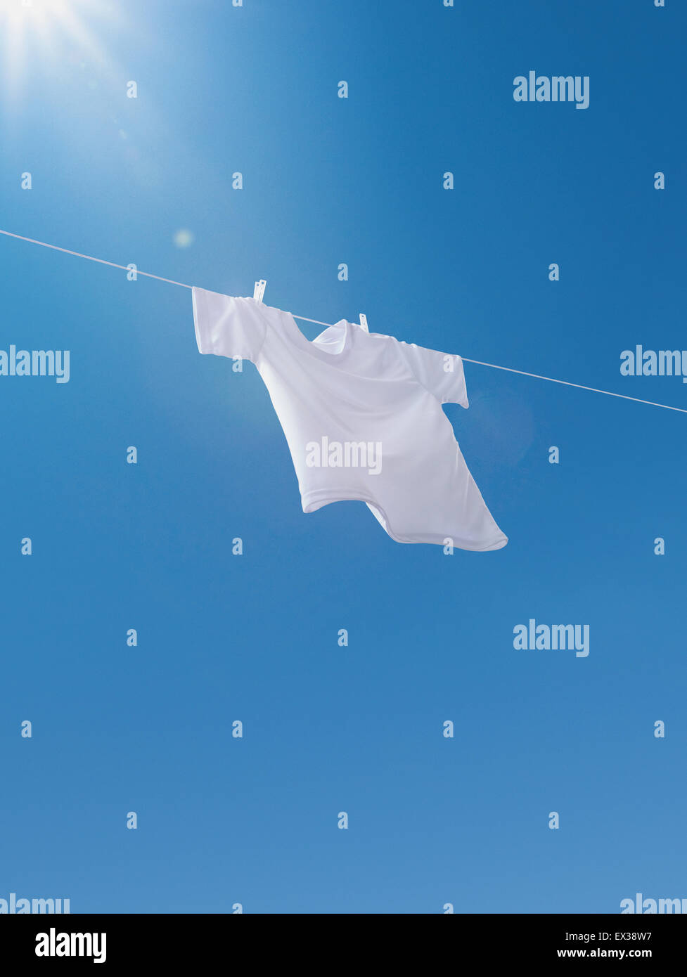 Laundry drying up on washing line Stock Photo