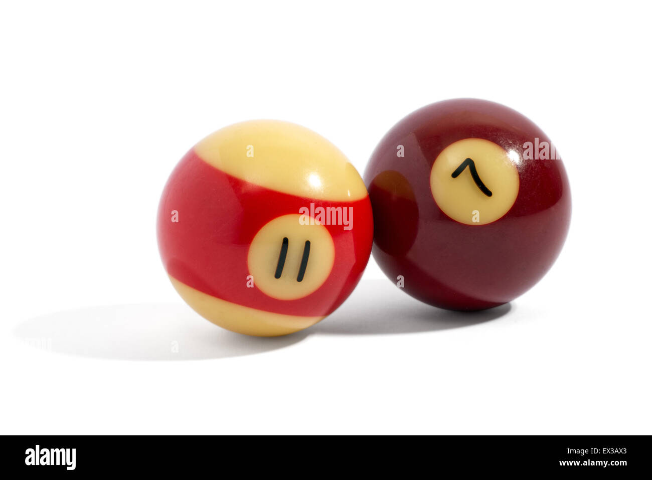 Two snooker balls, number 11 and 7 Stock Photo