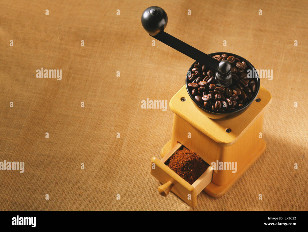 https://c8.alamy.com/comp/EX3C22/hand-grinding-coffee-mill-EX3C22.jpg