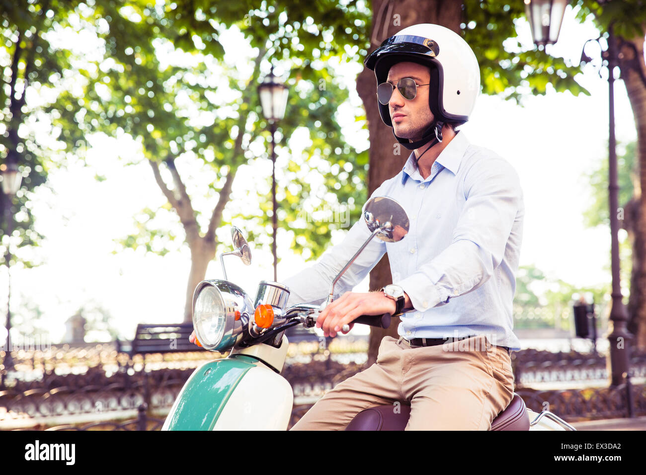 Italian man on scooter hi-res stock photography and images - Alamy