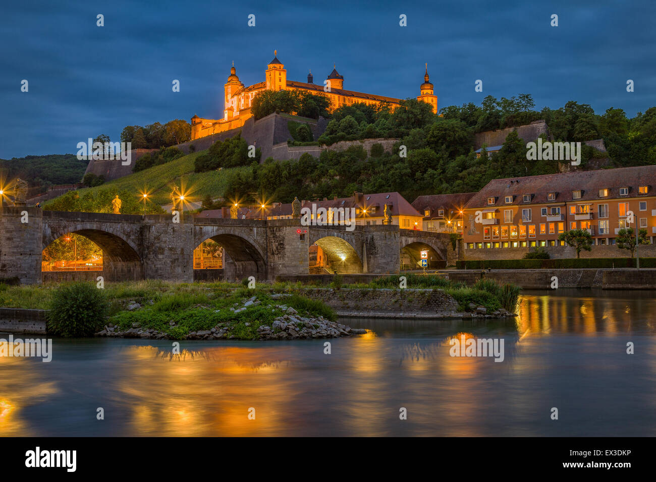 View across the River Main towards the Old Main Bridge and Marienberg Fortress in the evening, Wuerzburg, Lower Franconia Stock Photo