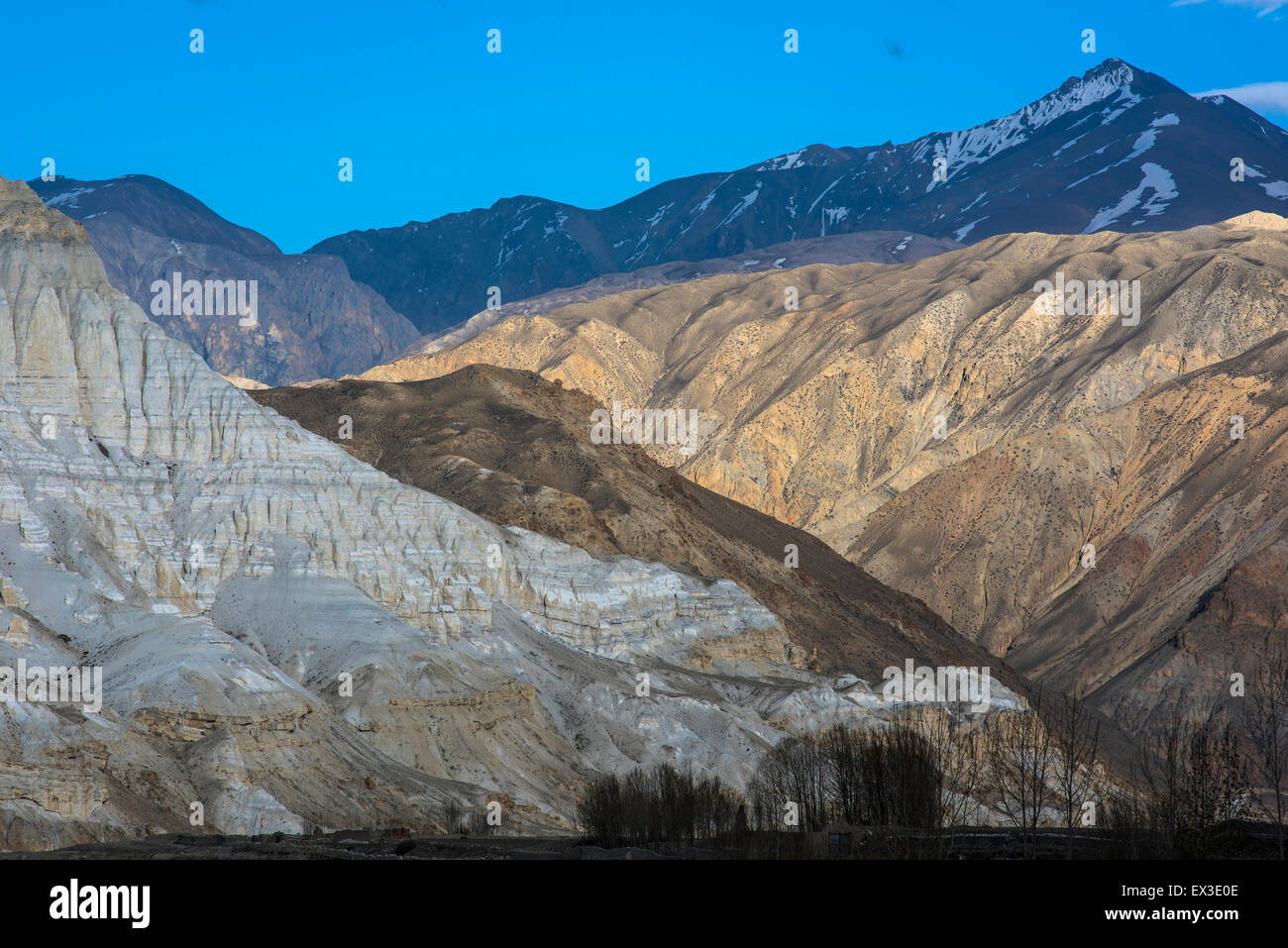Mountains, rock formations in the evening light, eroded landscape of different colours depending on the mineral composition of Stock Photo