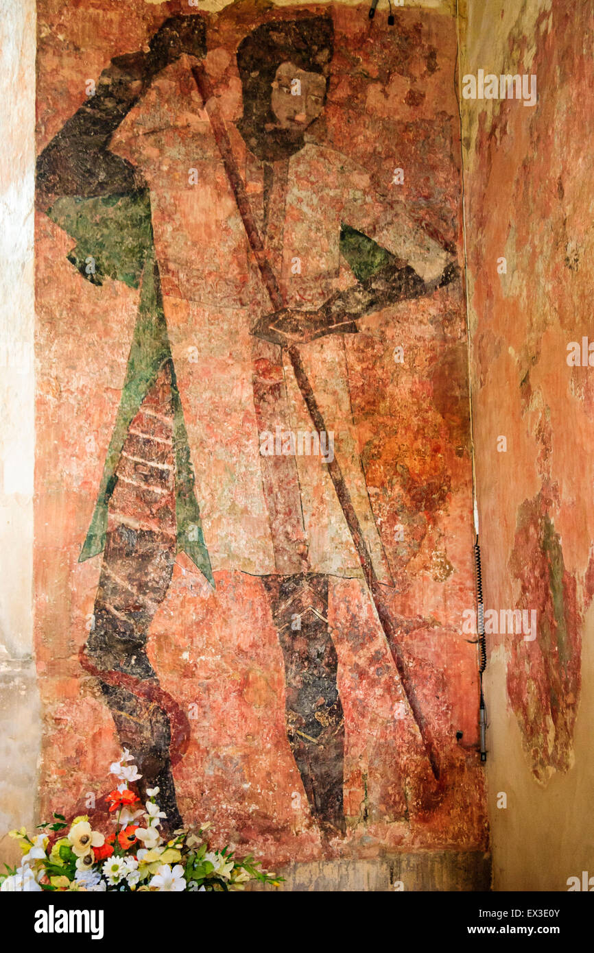 English ruined medieval castle, Farleigh Hungerford. A 15th century wall painting of St George killing the dragon on the wall of the castle chapel. Stock Photo