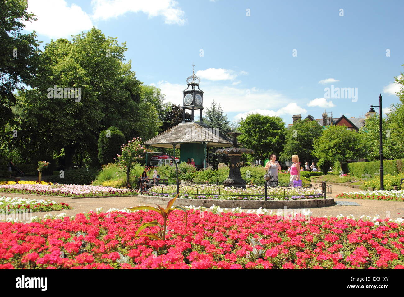 Flower beds in full bloom on a hot summer day at Hall Leys Park; a traditional English green space in Matlock, Derbyshire UK Stock Photo