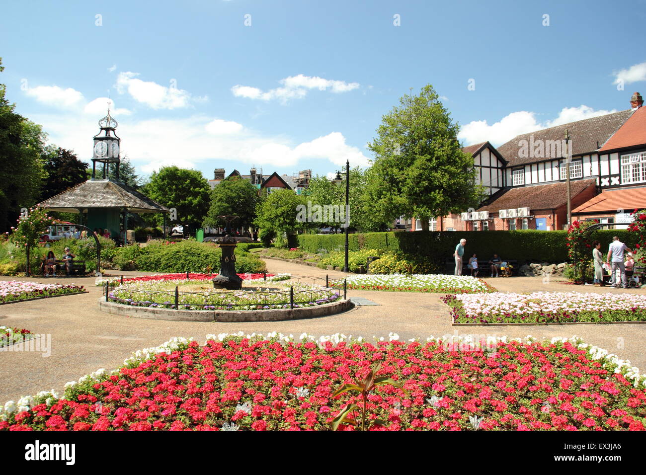 Flower beds in full bloom on a hot summer day at Hall Leys Park; a traditional English green space in Matlock, Derbyshire UK Stock Photo