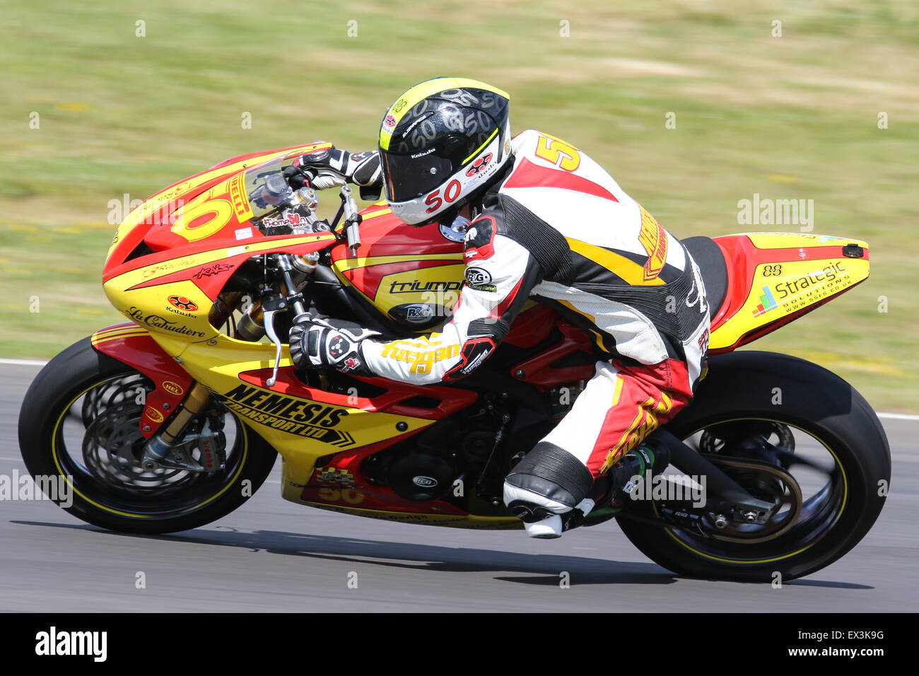 Bikers racing around Castle Combe Circuit for the Grand National Race ...