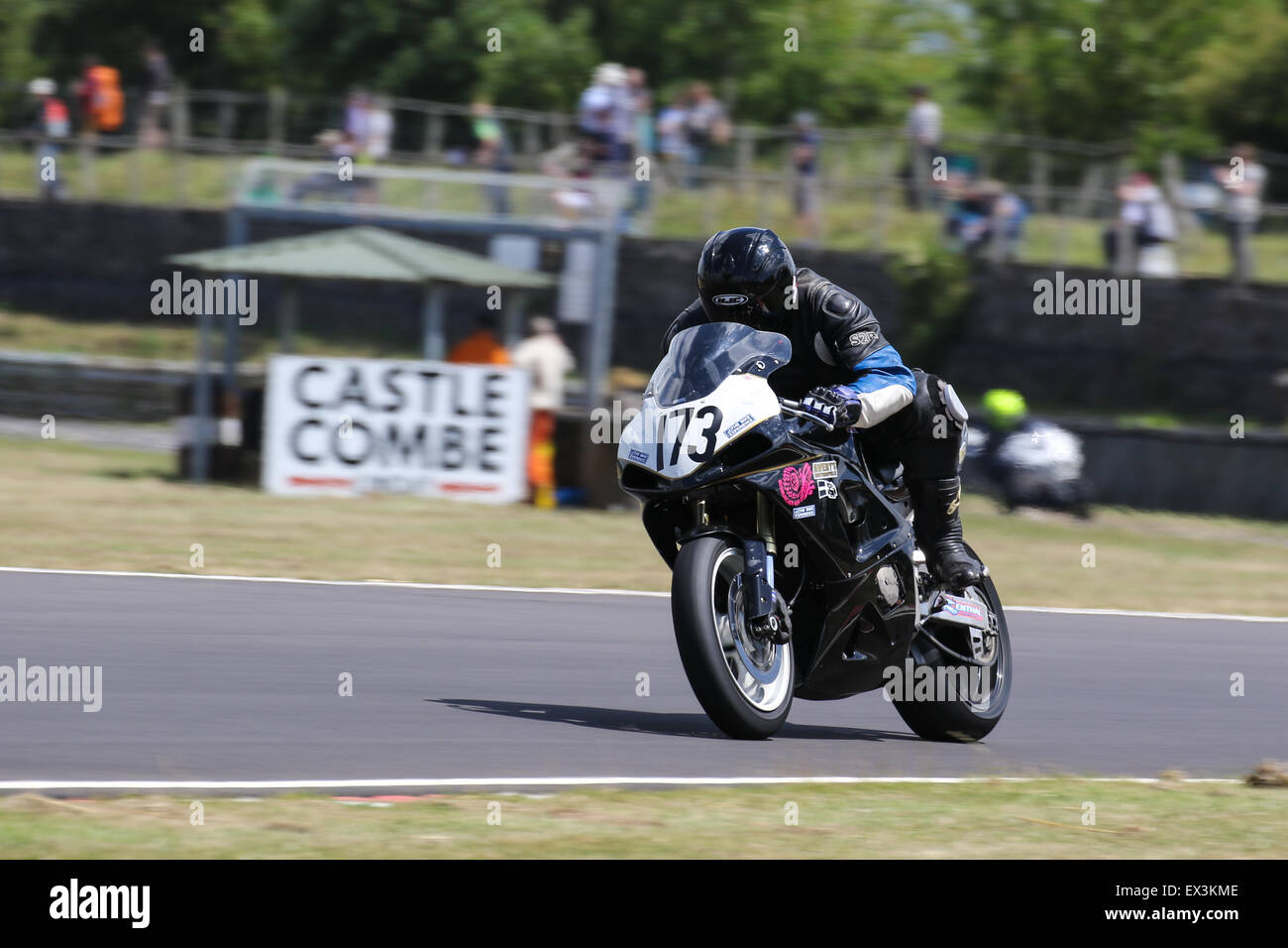 Bikers racing around Castle Combe Circuit for the Grand National Race ...