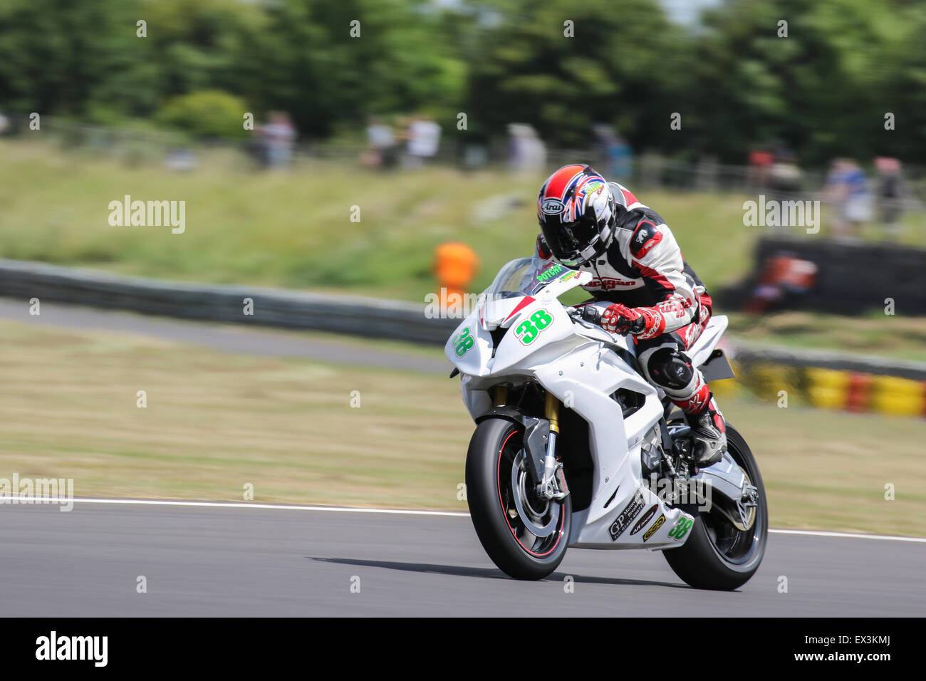 Bikers racing around Castle Combe Circuit for the Grand National Race ...