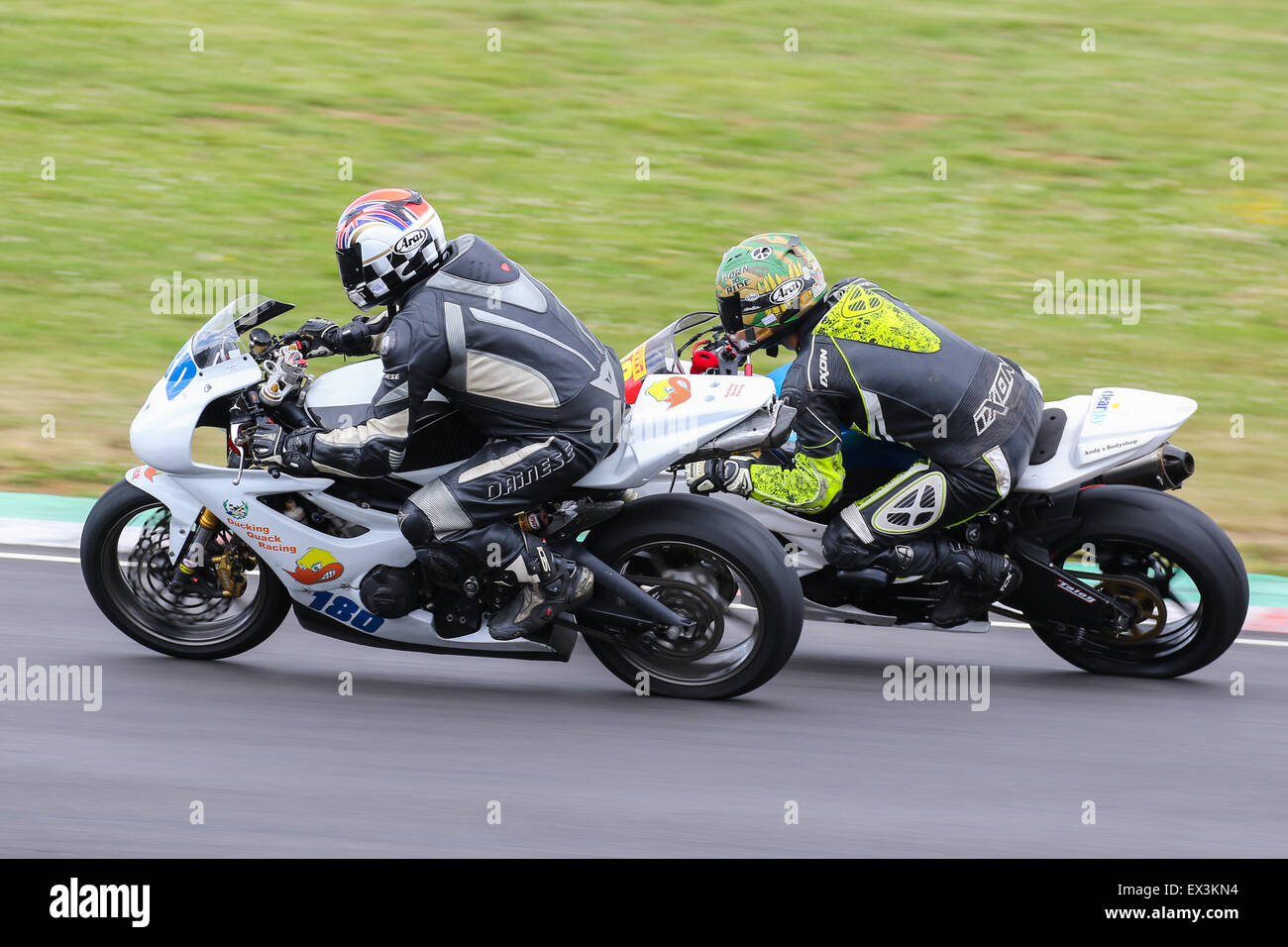 Bikers racing around Castle Combe Circuit for the Grand National Race ...