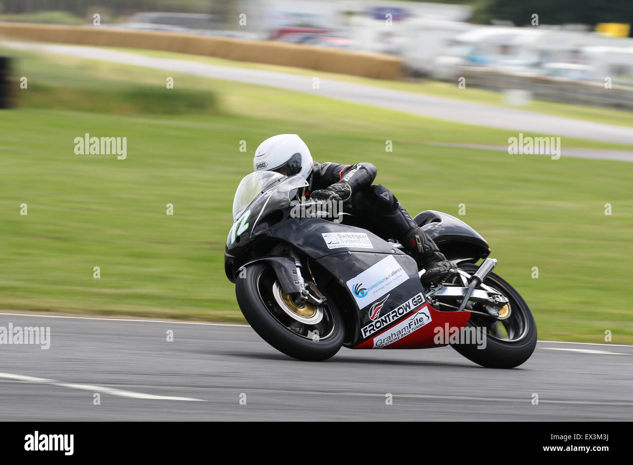 Bikers racing around Castle Combe Circuit for the Grand National Race ...