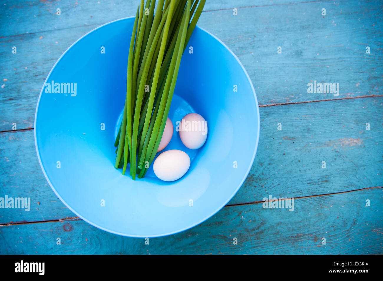 Natural white eggs in a blue bowl Stock Photo Alamy