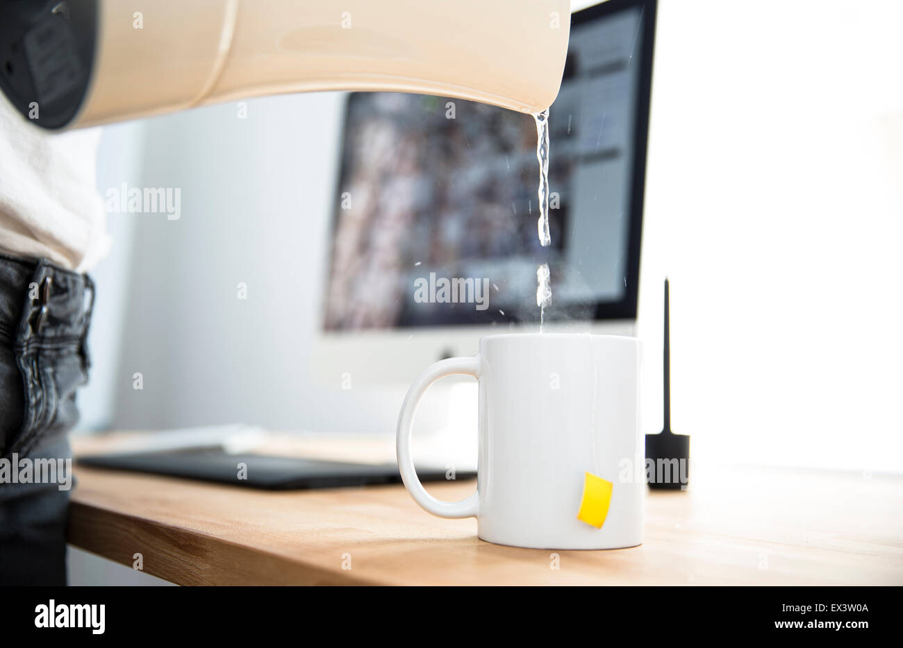 Pouring water in a cup hires stock photography and images Alamy