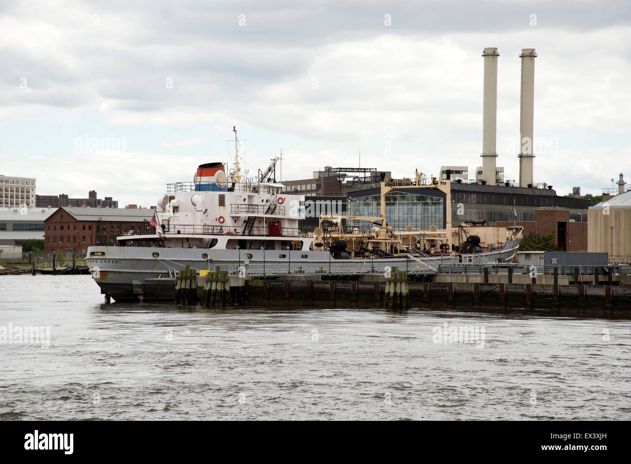 Newtown Creek a sewage sludge coastal tanker. Brooklyn New York USA Stock Photo