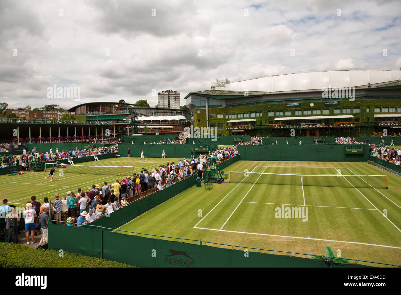 Wimbledon, London, UK. 6th July, 2015. Tennis, Wimbledon, Overall view outside courts 8 and 9 with in the background Centrecourt Credit:  Henk Koster/Alamy Live News Stock Photo