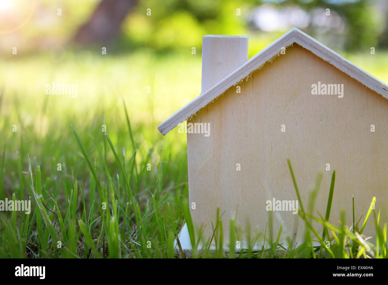 wooden house on the grass Stock Photo - Alamy