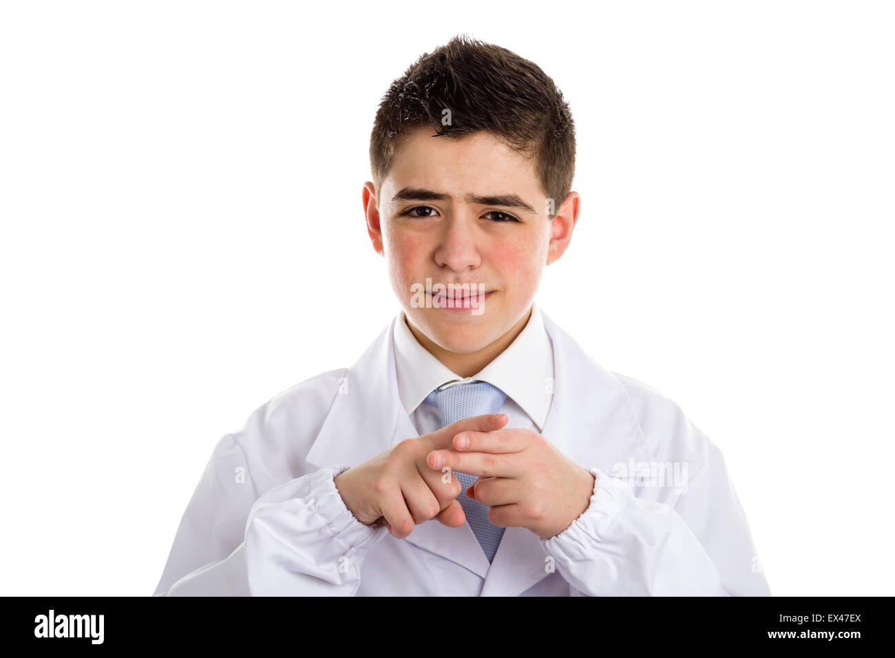 A boy doctor in blue tie and white coat helps to feel medicine more friendly: The forefinger of one hand counts off fingers of other hand meaning that the subject is well thought out. His acne skin has not ben retouched Stock Photo