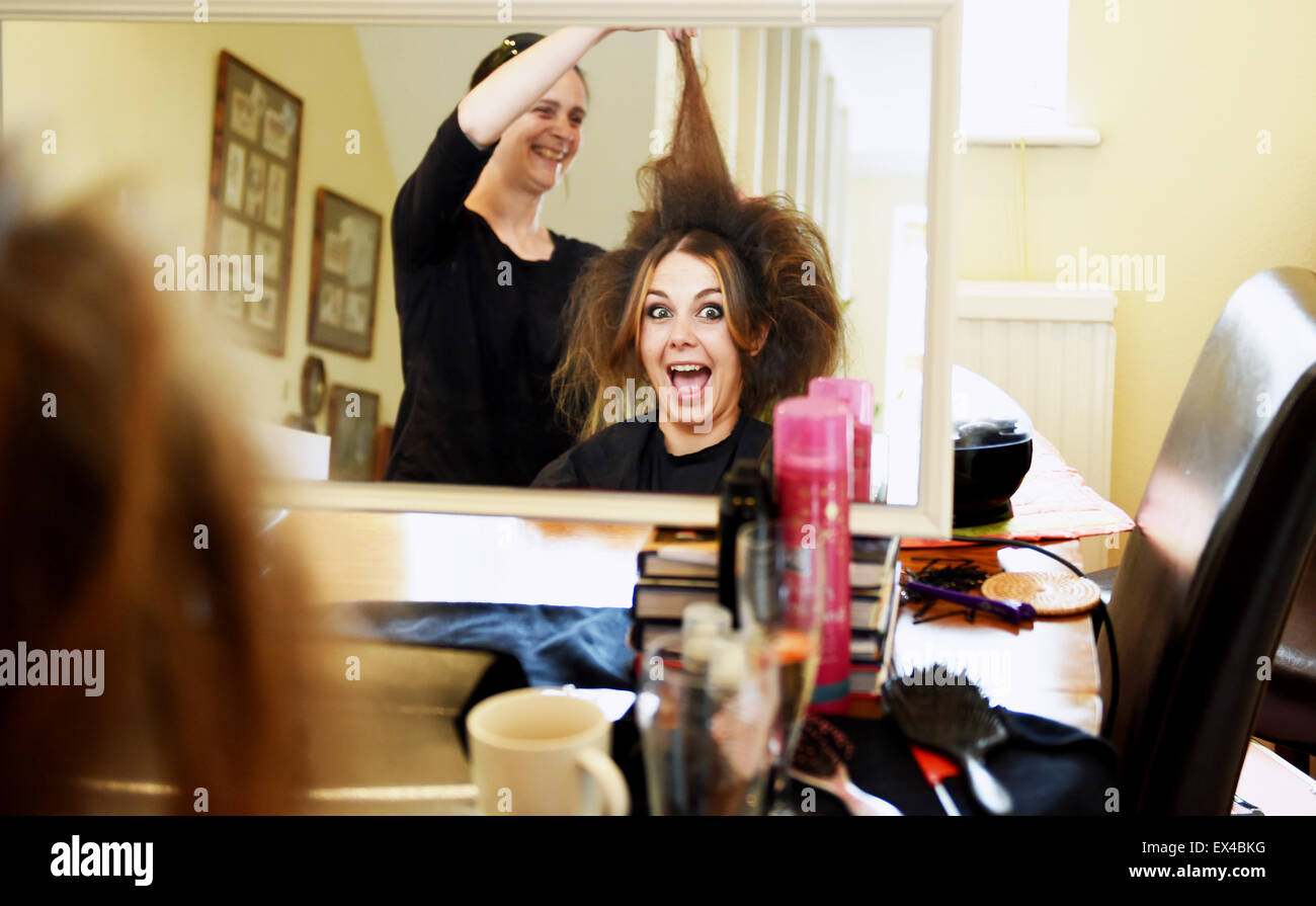 Young Bride Having Her Wedding Hair Prepared By Hairdresser At