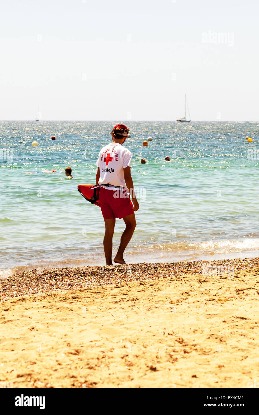 Spanish lifeguard patrolling beach sea coast coastline sharks resort