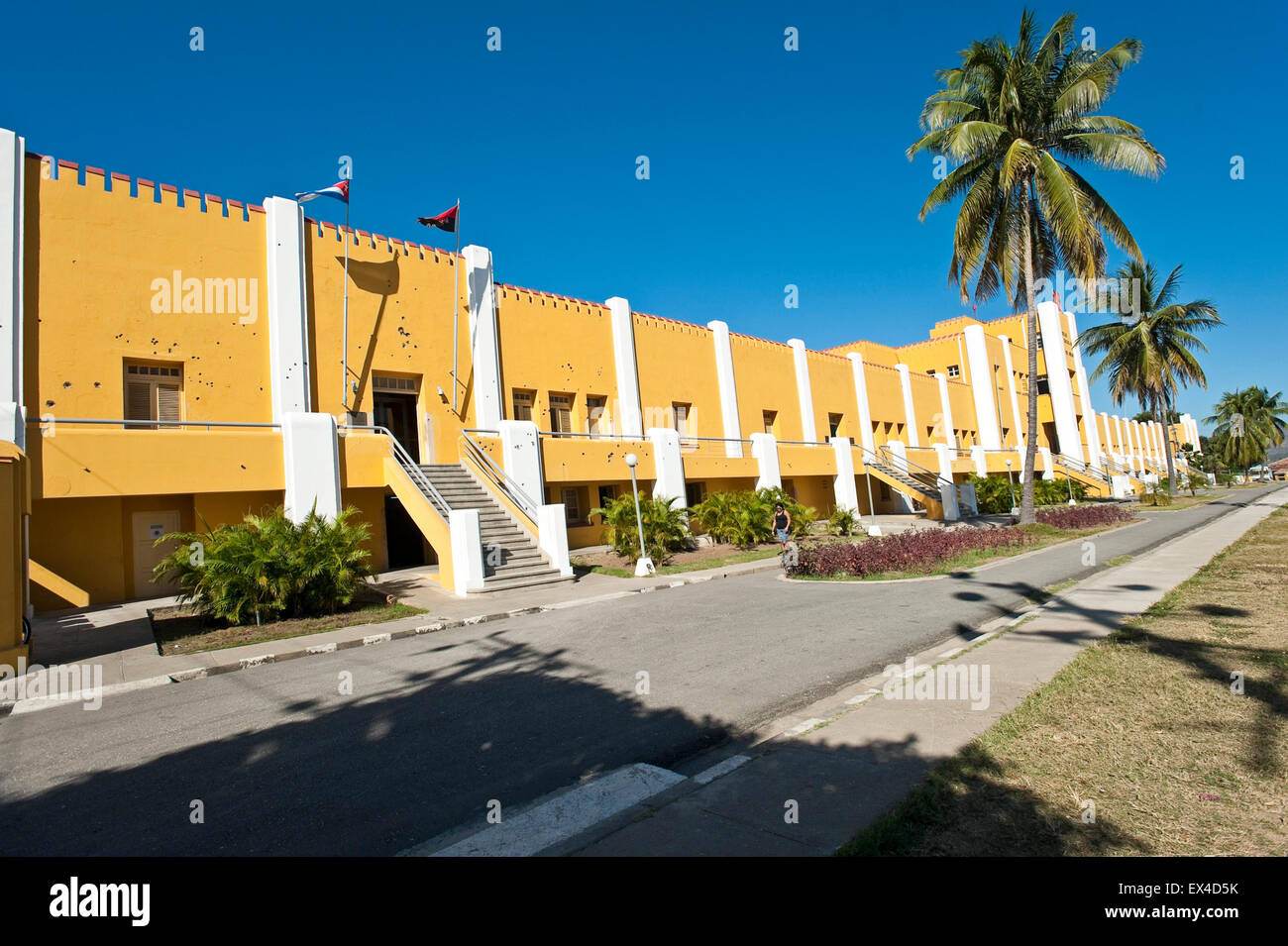 Horizontal view of the bullet holed front of Moncada Barracks in Santiago de Cuba, Cuba. Stock Photo