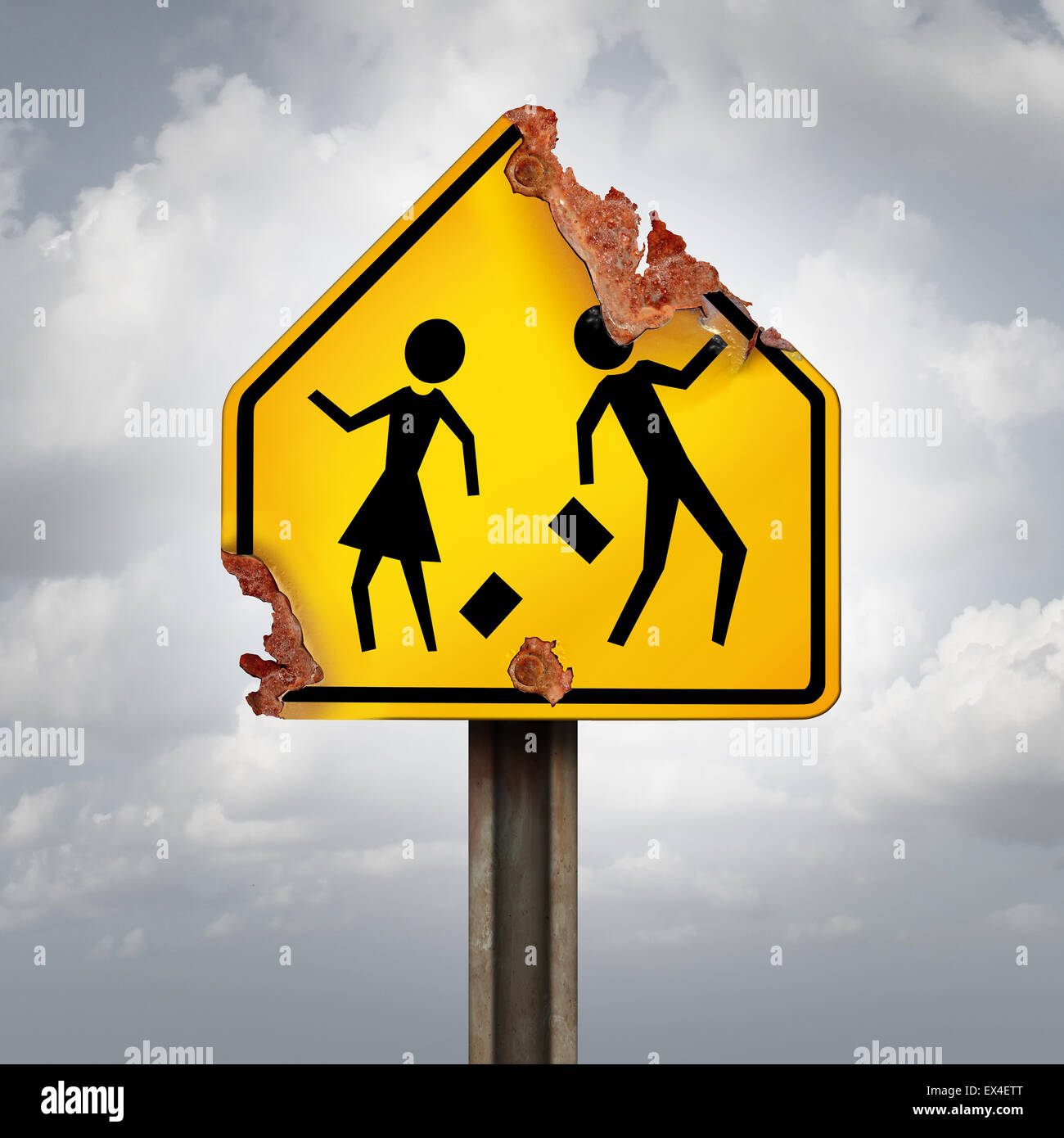Education decline and neglected school problems concept as a rusted student crossing traffic sign as a symbol of negligence in public schools and teaching or funding challenges for special learning and literacy programs. Stock Photo