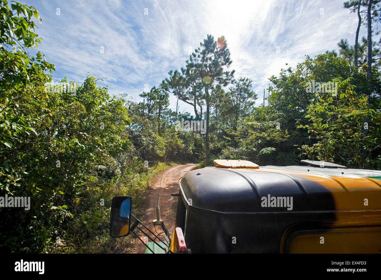 Horizontal view of an old Russian military truck transporting tourists around Topes de Collantes National Park in Cuba. Stock Photo