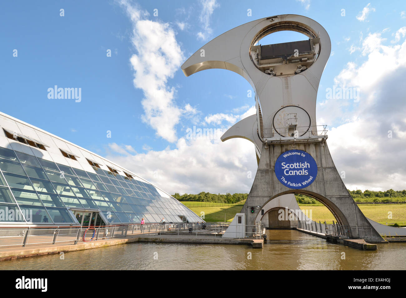The Falkirk Wheel and visitor centre - the world's first and only rotating boat lift - viewed from the boat trip Stock Photo