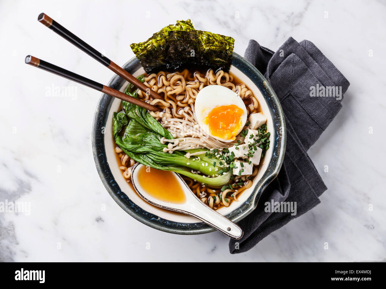 Miso Ramen Asian noodles with egg, enoki and pak choi cabbage in bowl