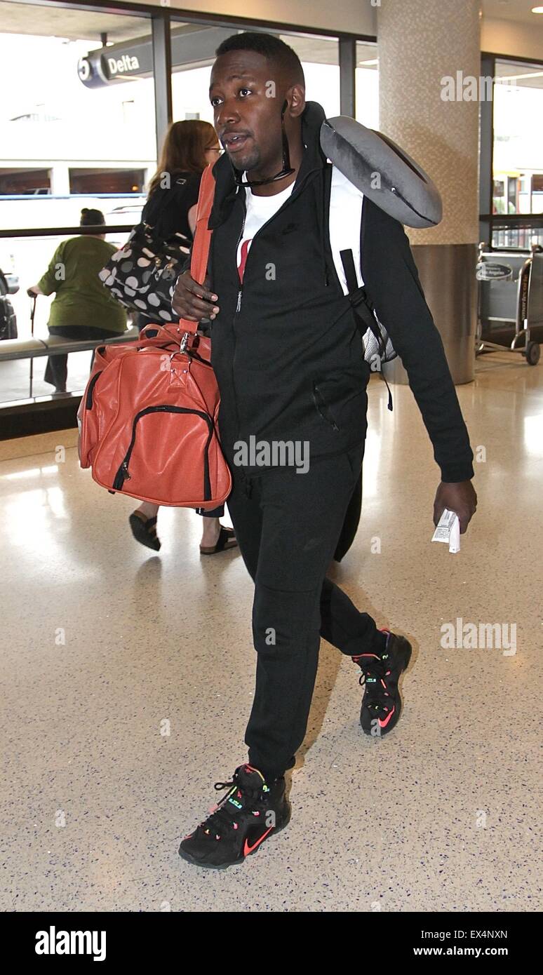 Lamorne Morris, best known for playing Winston in the Fox sitcom 'New Girl', departs Los Angeles International Airport (LAX)  Featuring: Lamorne Morris Where: Los Angeles, California, United States When: 05 May 2015 C Stock Photo