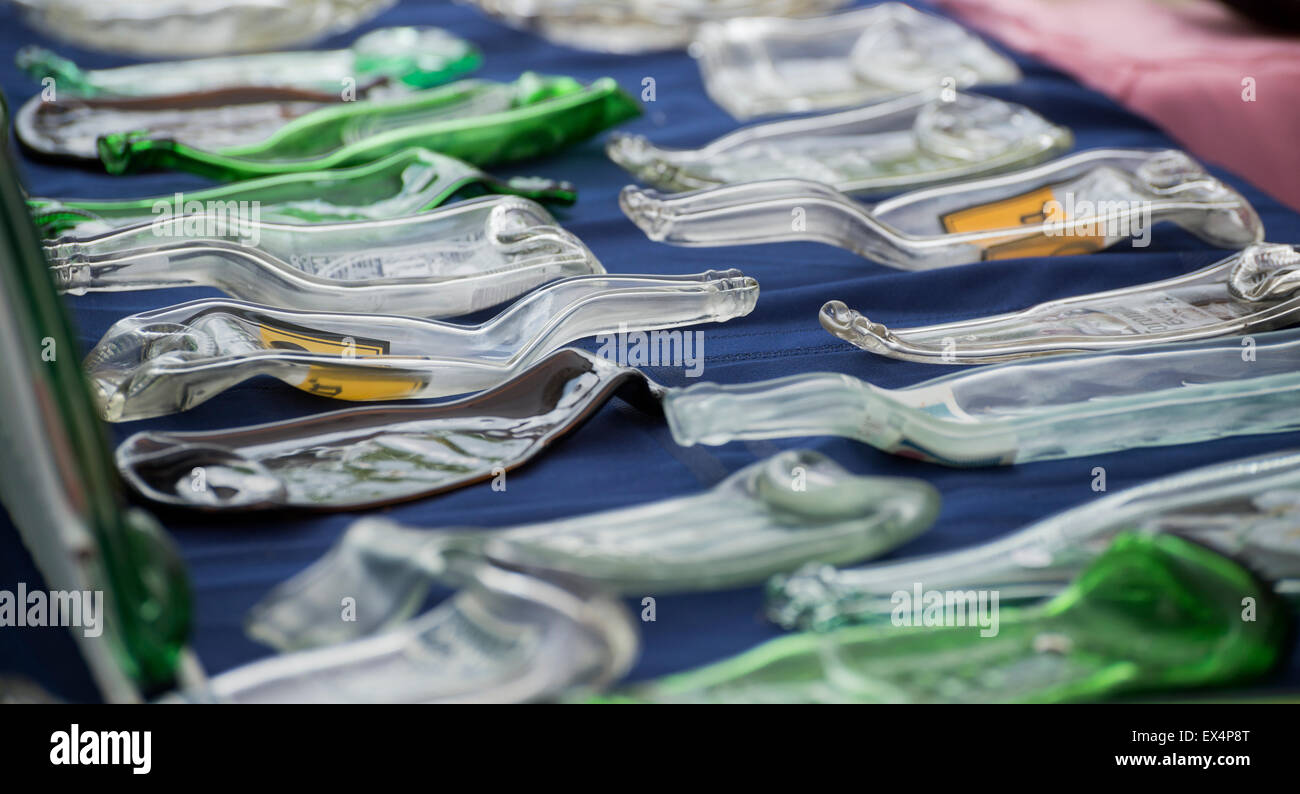 Melted glass bottle spoon rests for sale at Pioneer Days festival in High Springs, Florida. Stock Photo