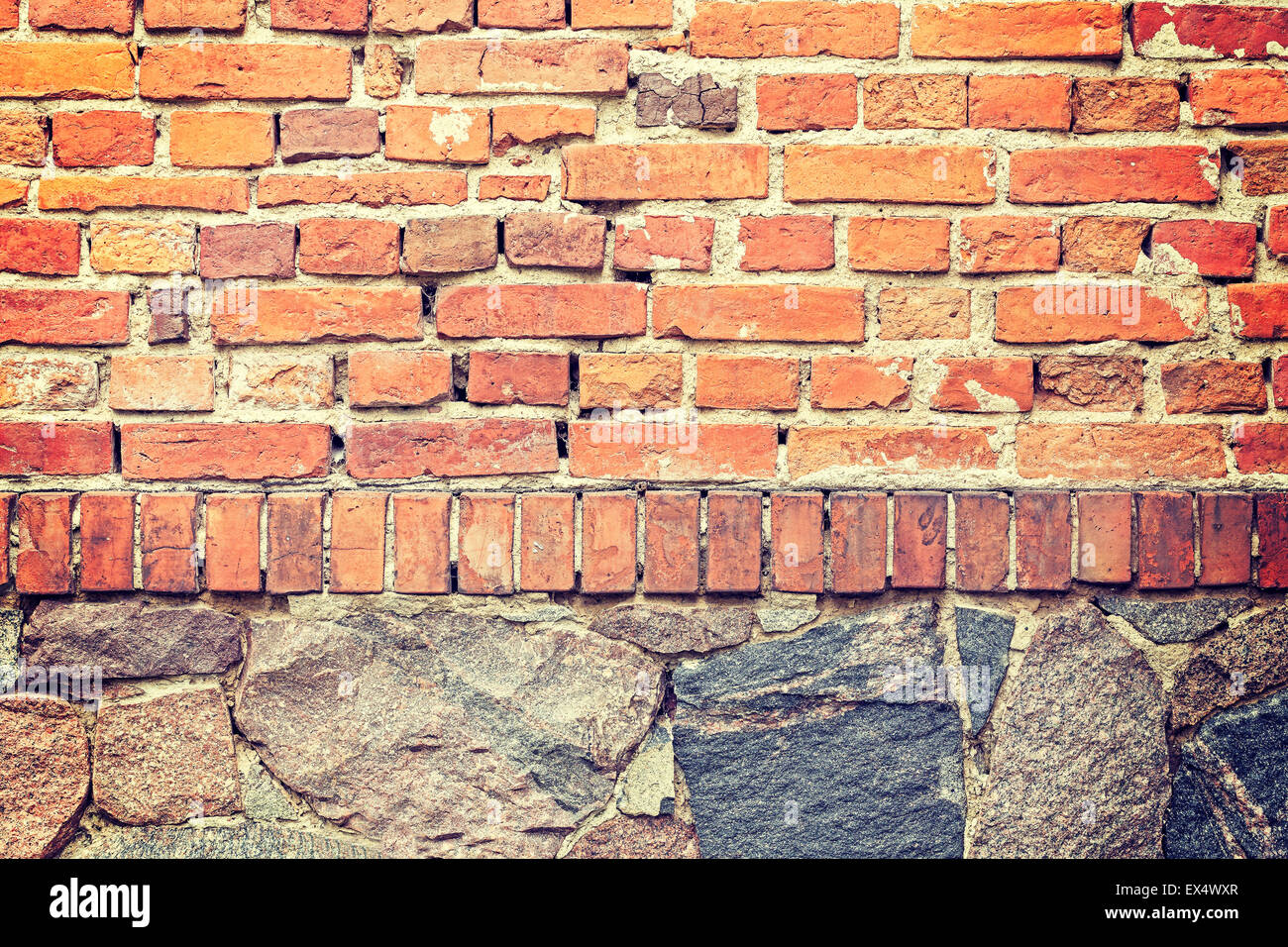 Brick and stone wall background or texture. Stock Photo