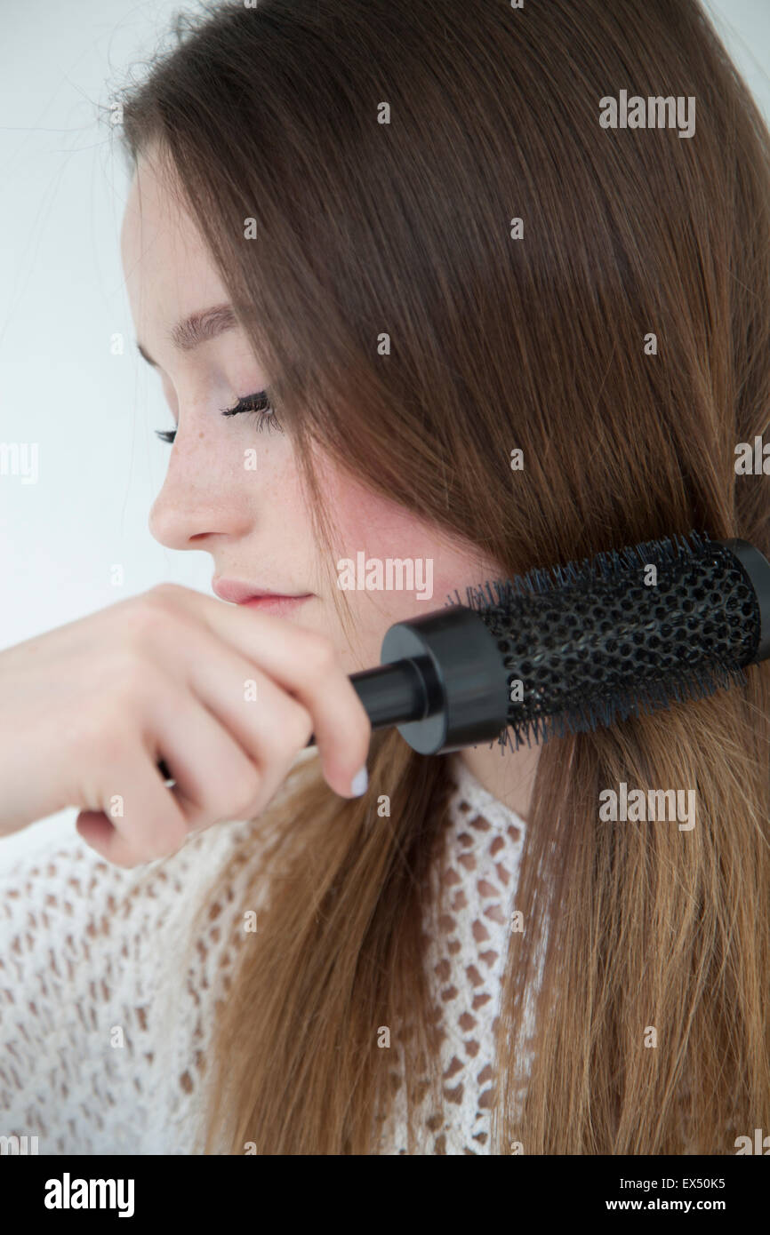 Teen Girl Brushing Hair High Resolution Stock Photography and Images ...