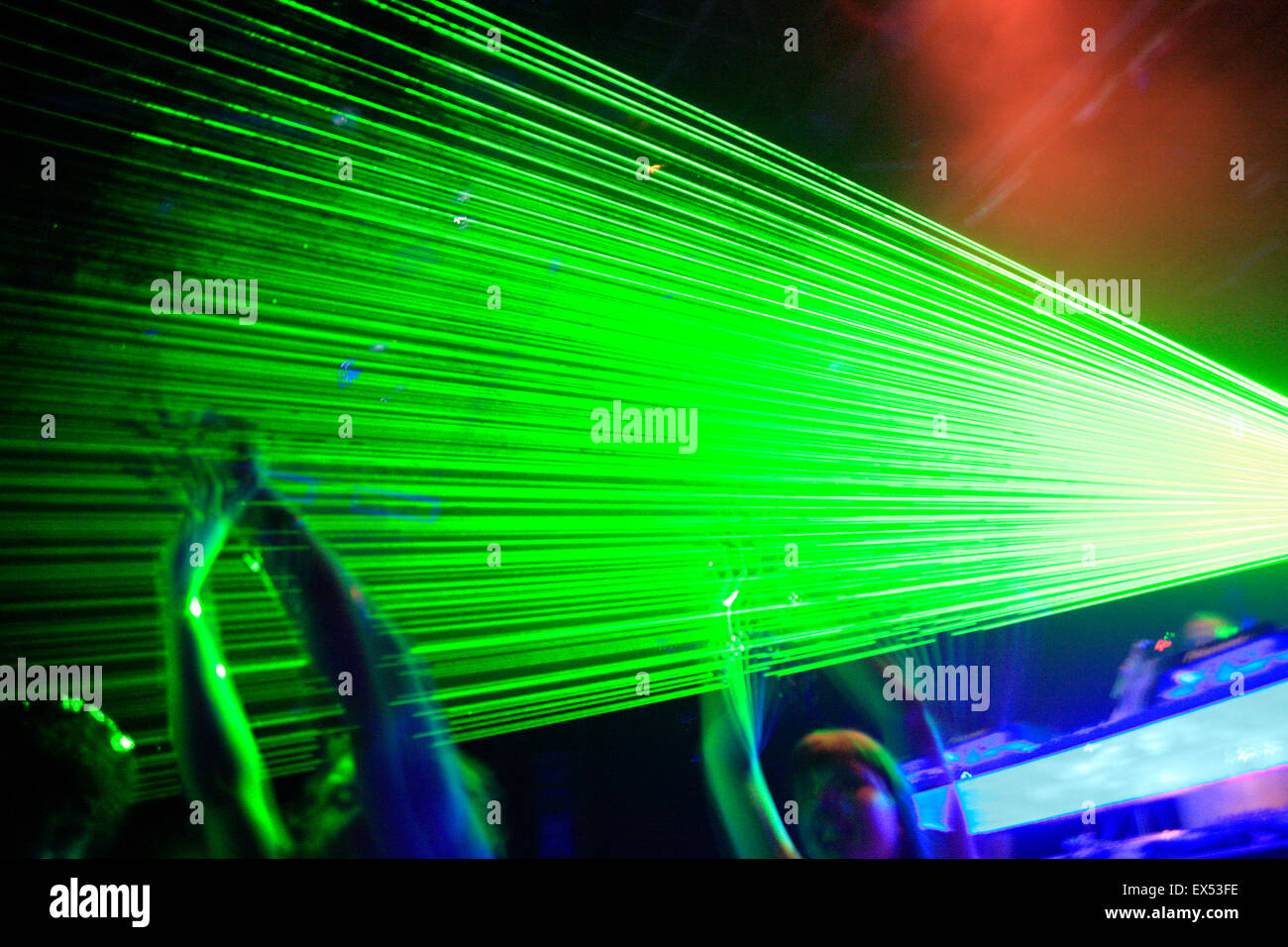 Image of a lazer / laser beams frequencies and dancers waiving their hands  in the air in a greek nightclub. Athens, Greece Stock Photo - Alamy