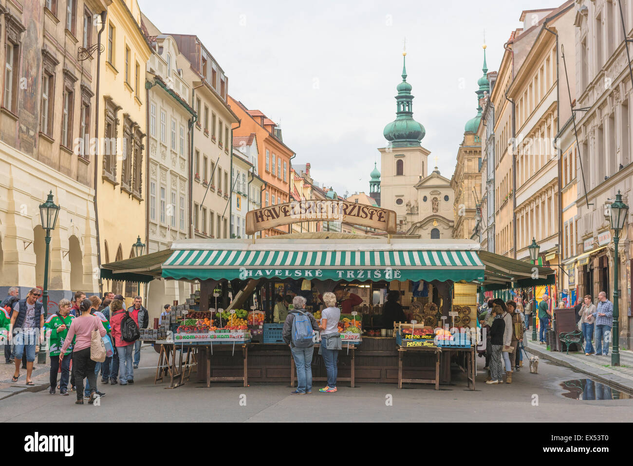 Prague market, view of tourists browsing stalls in Prague's largest market - the Havelske - in the Stare Mesto district of the city, Czech Republic. Stock Photo